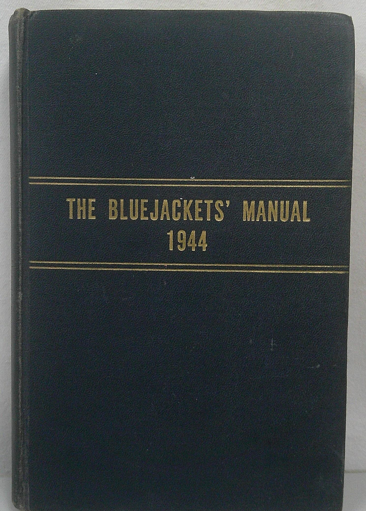 The Bluejackets' Manual 1944 Twelfth Edition in dark blue cloth with gilt bands, view 2