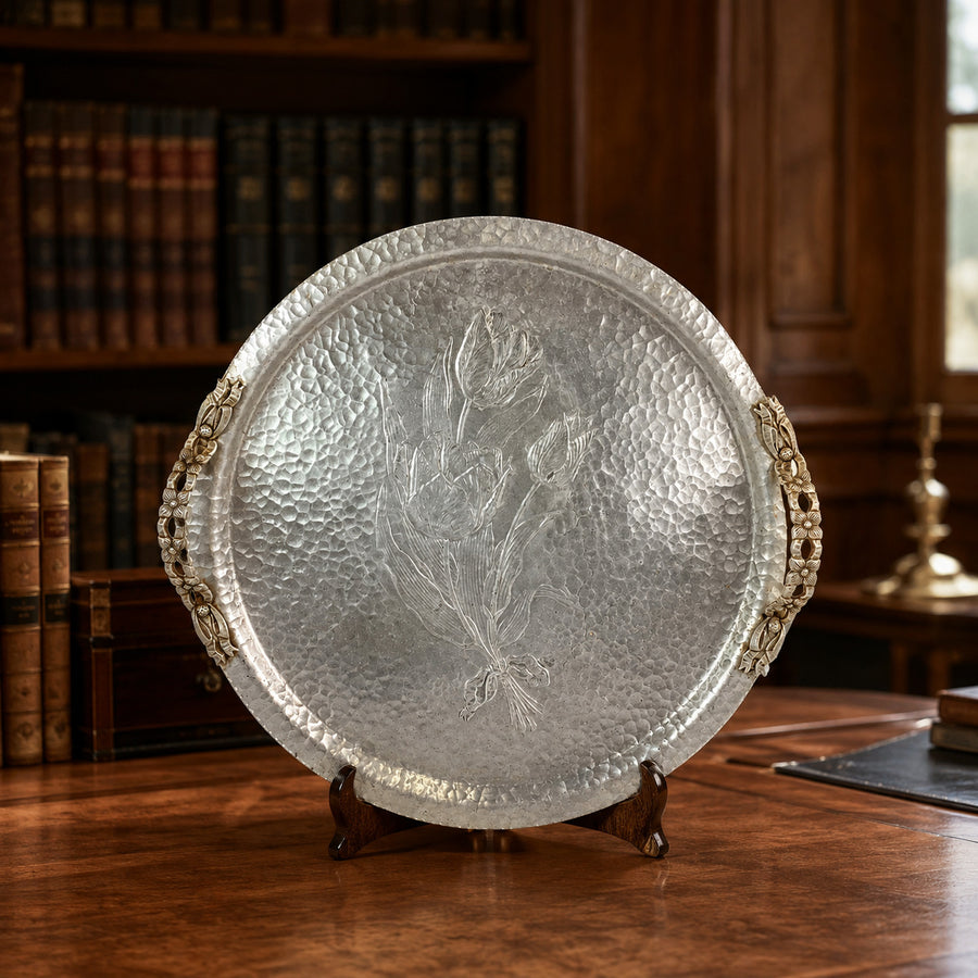 Round hammered aluminum tray with embossed tied tulip bouquet and floral handles