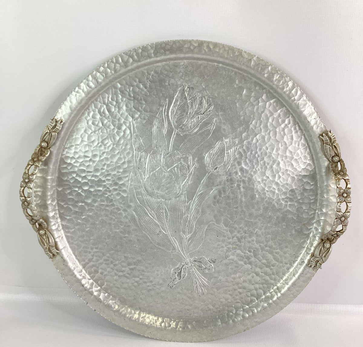 Round hammered aluminum tray with embossed tied tulip bouquet and floral handles, view 2