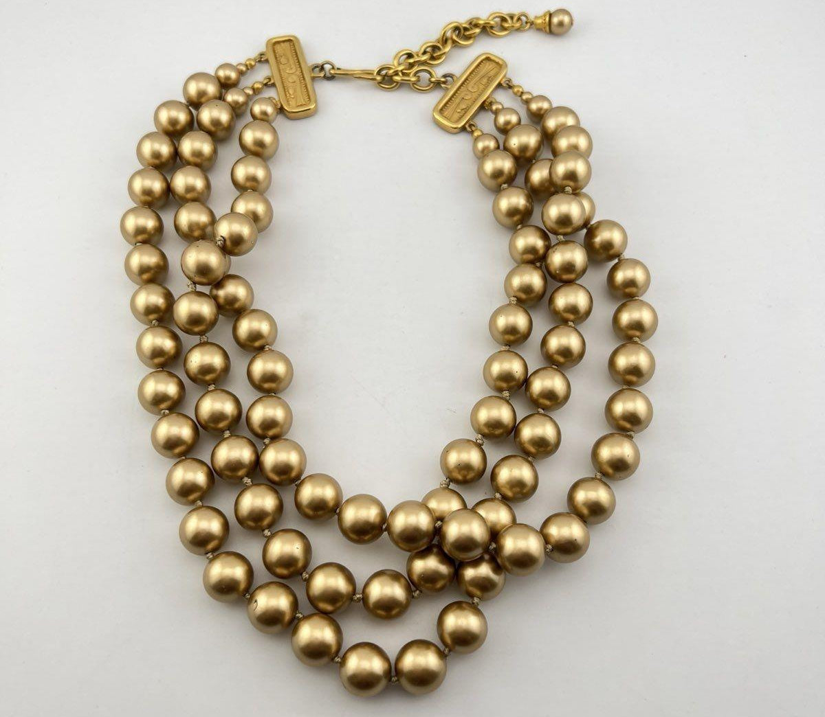Carolee matte gold-tone triple-strand knotted bead necklace with matching round clip earrings, view 3