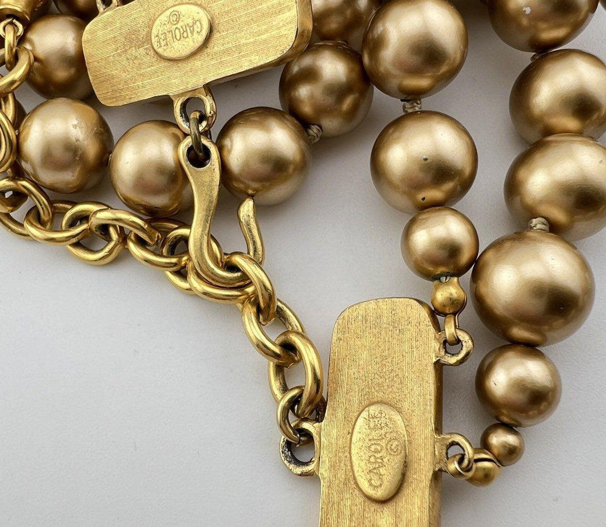 Carolee matte gold-tone triple-strand knotted bead necklace with matching round clip earrings, view 5