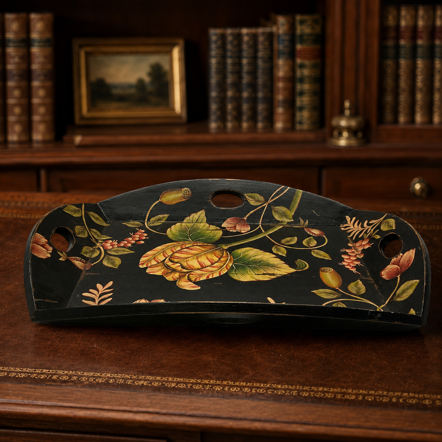 Large black painted wooden gallery tray with gold, rust and green florals and cutout handles