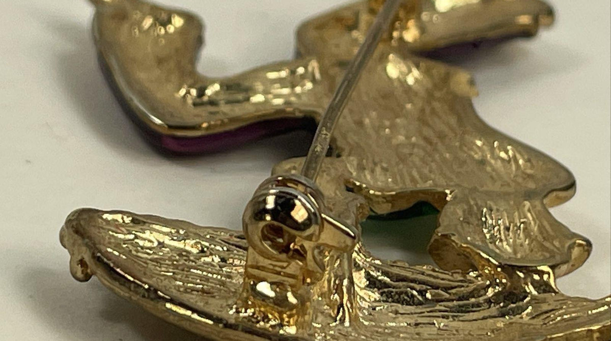 Gold-tone enamel brooch of a jester holding a jeweled parasol, view 3