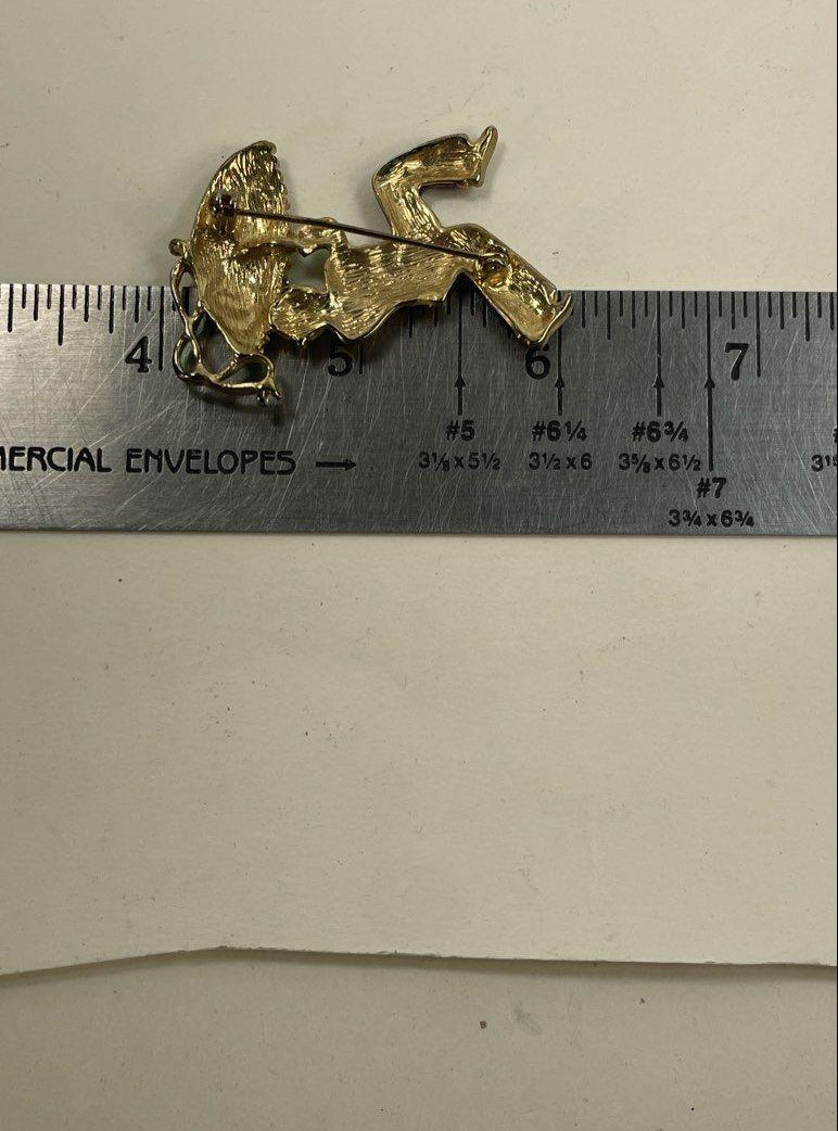 Gold-tone enamel brooch of a jester holding a jeweled parasol, view 4