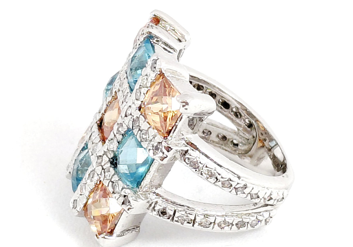 Silver-tone cocktail ring with grid of square-cut blue and orange stones and clear accents, view 4