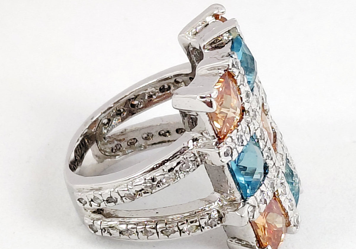 Silver-tone cocktail ring with grid of square-cut blue and orange stones and clear accents, view 5