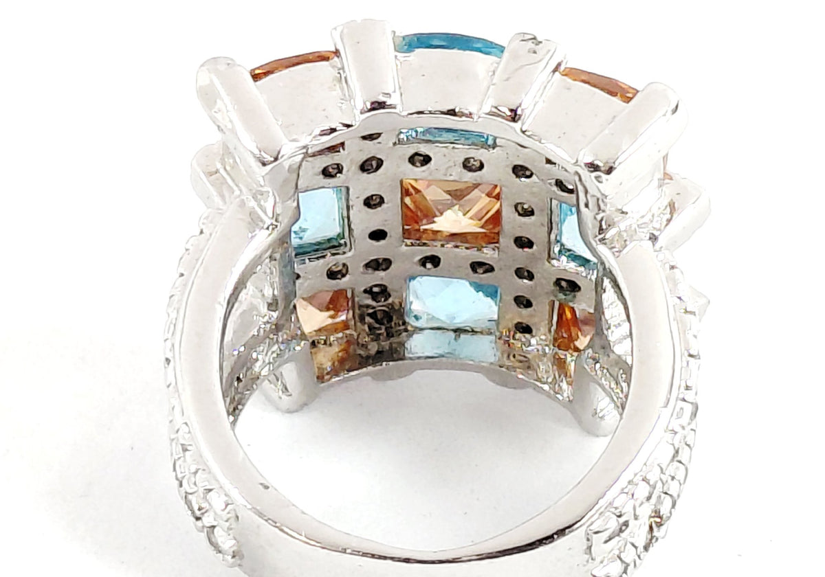 Silver-tone cocktail ring with grid of square-cut blue and orange stones and clear accents, view 6