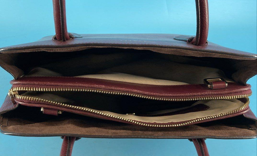 Radley London burgundy leather structured satchel with rolled top handles and patent handle tabs, view 5