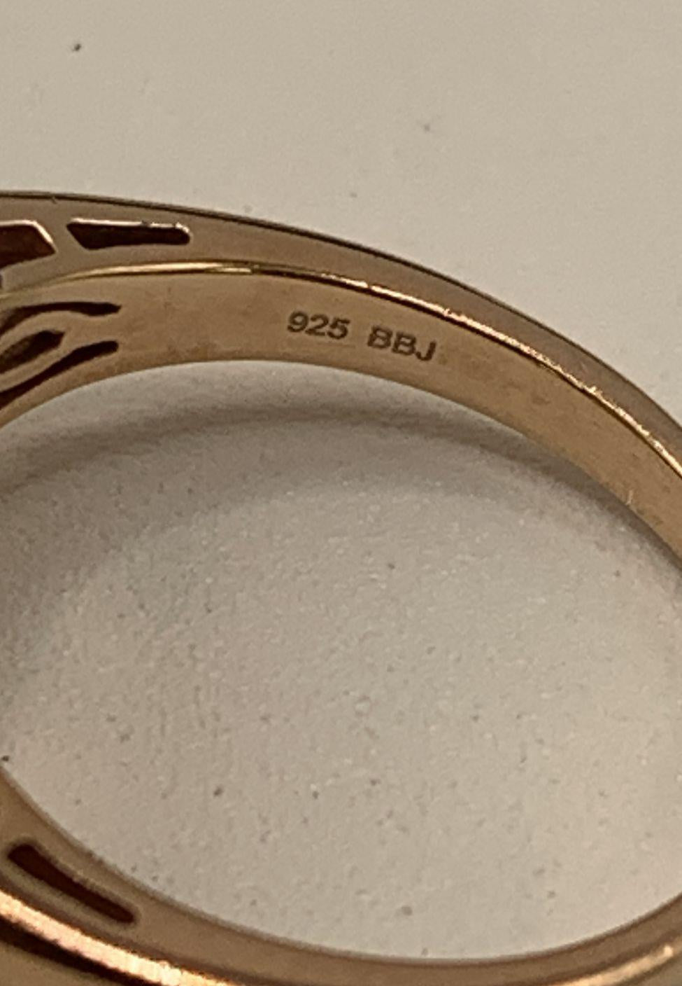 Signed BBJ gold-tone cocktail ring with oval champagne center stone and clear cluster, view 5