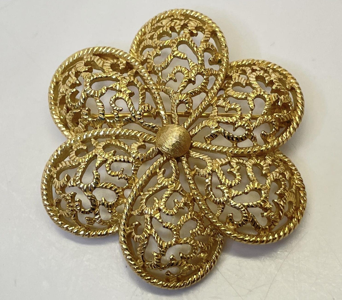Gold-tone openwork six-petal flower brooch with rope-textured borders, view 2