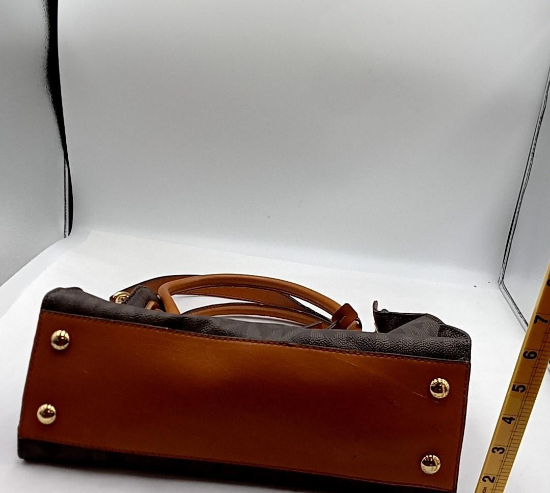 Brown monogram coated canvas satchel with tan leather trim, gold-tone padlock and shoulder strap, view 5