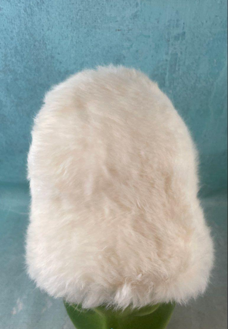 White plush bucket hat with black lining in hexagonal Lion Store Toledo hatbox, view 7