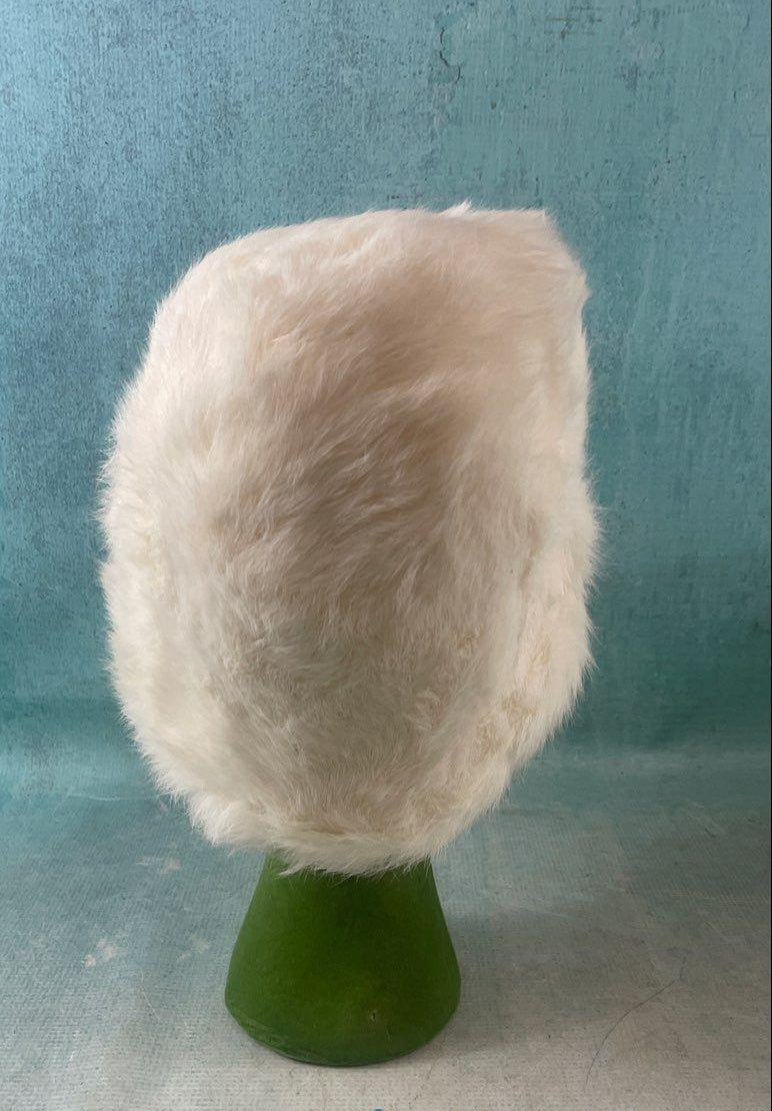 White plush bucket hat with black lining in hexagonal Lion Store Toledo hatbox, view 10