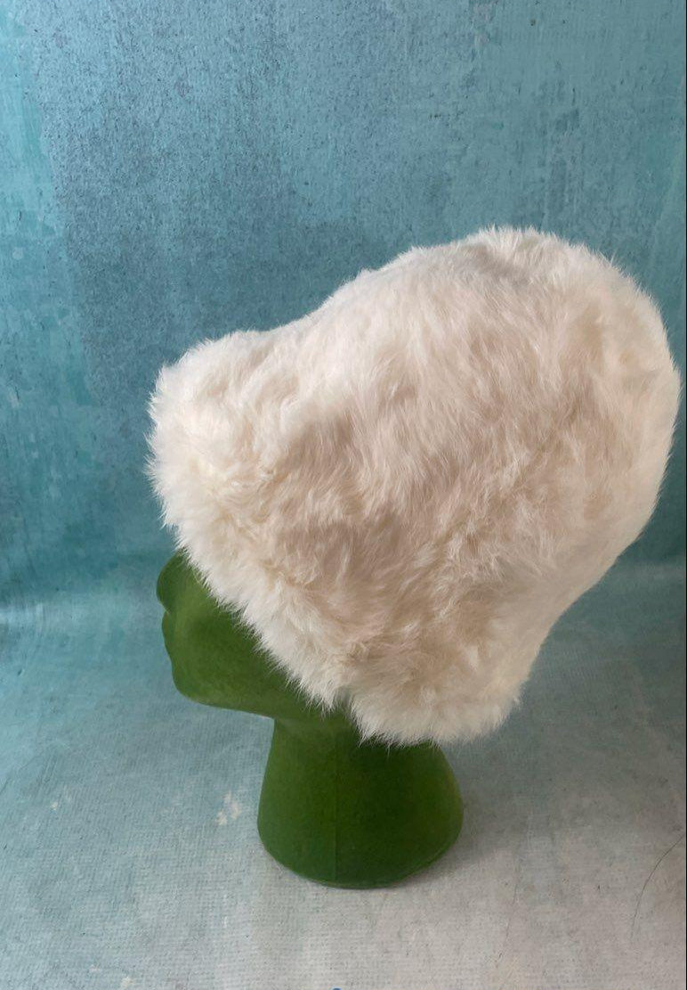 White plush bucket hat with black lining in hexagonal Lion Store Toledo hatbox, view 11
