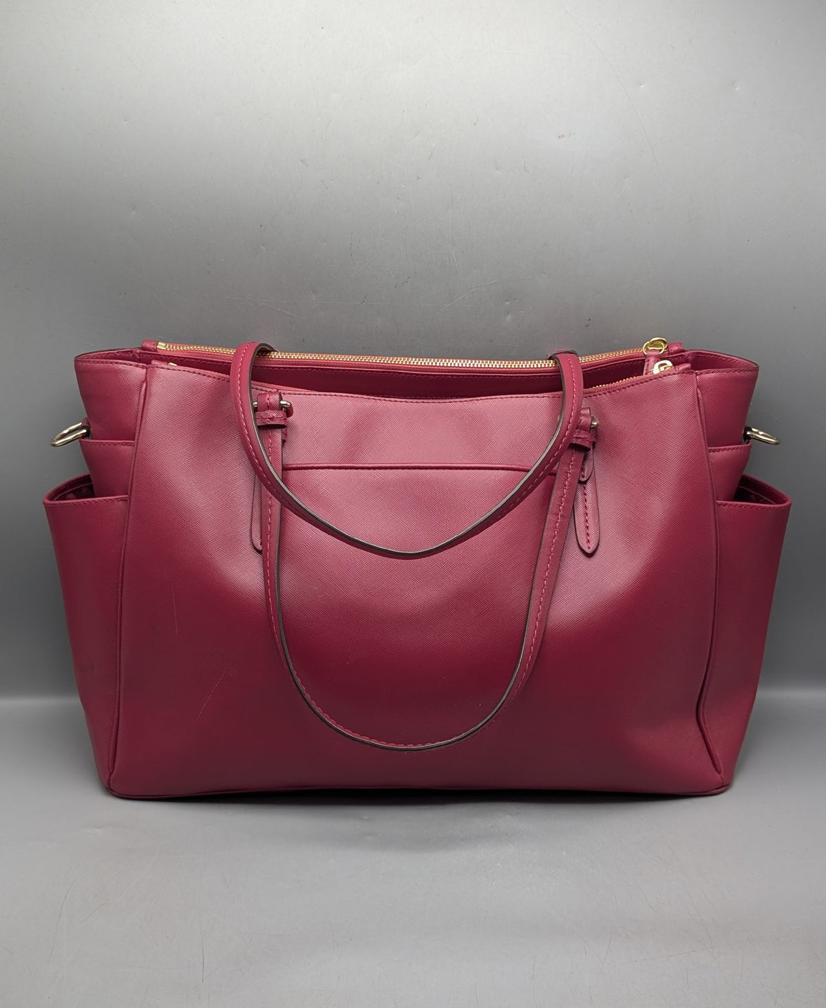 Berry pink crossgrain leather multifunction tote bag with double handles and shoulder strap, view 3