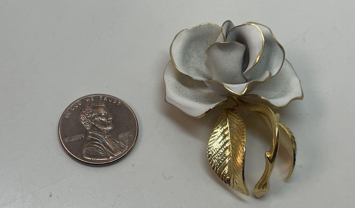 White rose brooch with gold-tone textured leaves and curved stem, view 3