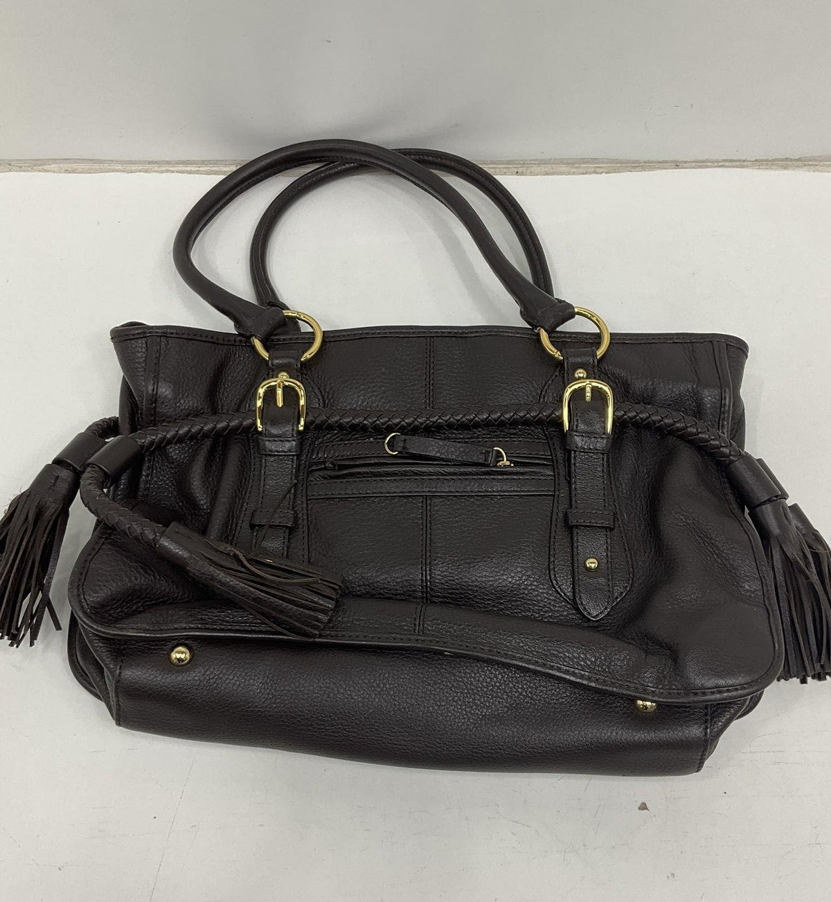 Adrienne Vittadini zebra pattern satchel with dark brown body, braided trim and side tassels, view 3