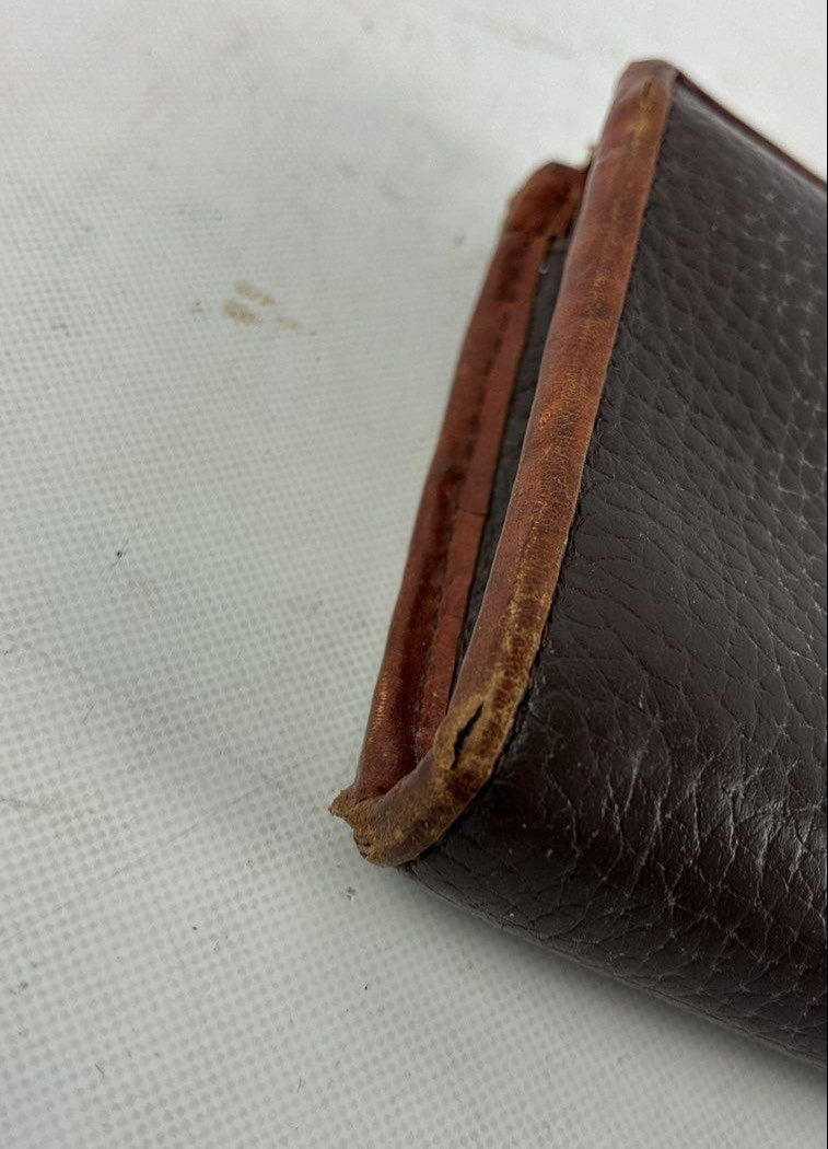 Dooney & Bourke brown pebbled leather zip around wallet with tan trim and red interior, view 3