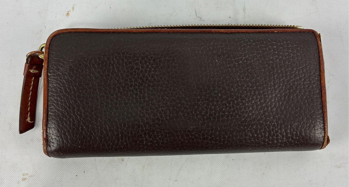 Dooney & Bourke brown pebbled leather zip around wallet with tan trim and red interior, view 4