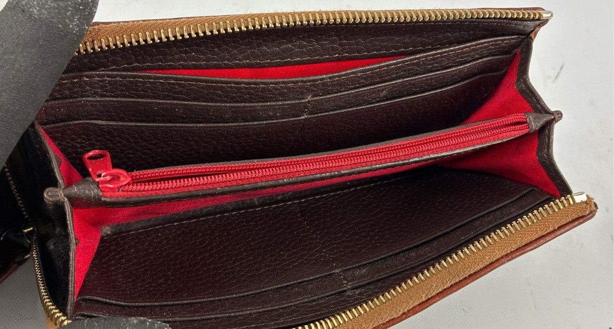 Dooney & Bourke brown pebbled leather zip around wallet with tan trim and red interior, view 5