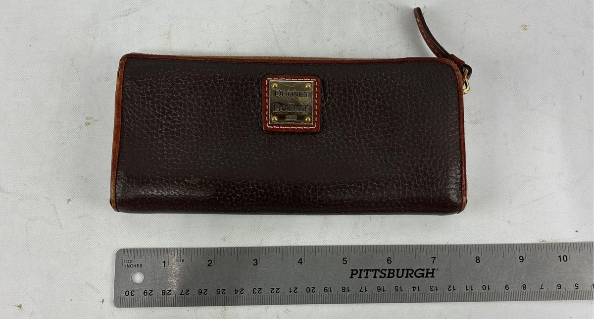 Dooney & Bourke brown pebbled leather zip around wallet with tan trim and red interior, view 7
