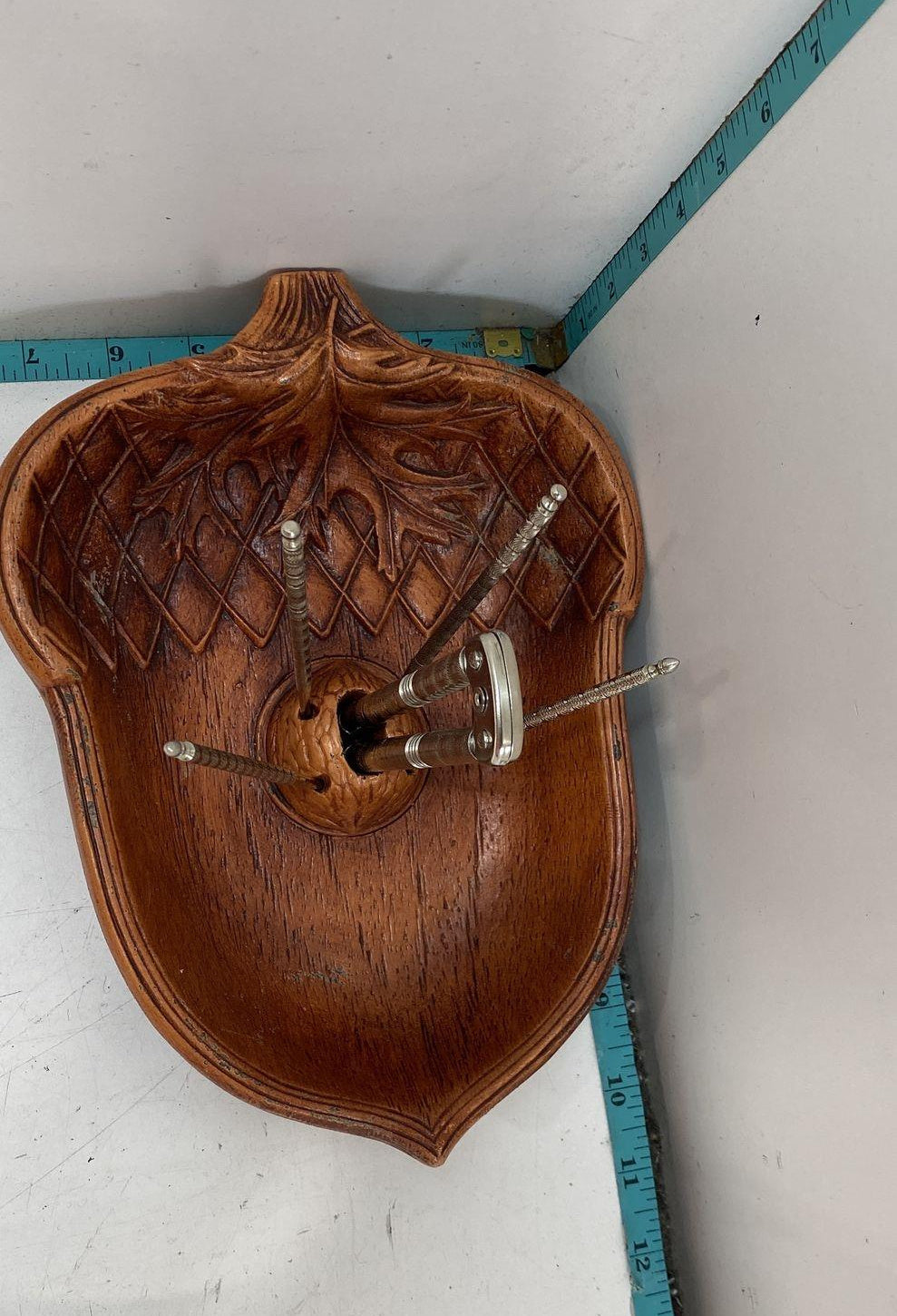 Molded acorn-shaped nut serving tray with leaf relief, nutcracker and four metal picks, view 3