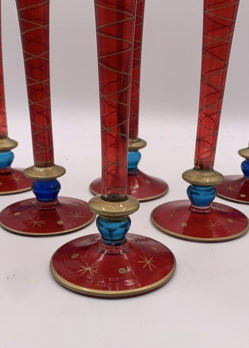 Six tall champagne flutes in ruby red and green with blue knops and gold-tone accents, view 4