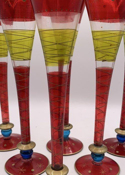 Six tall champagne flutes in ruby red and green with blue knops and gold-tone accents, view 5