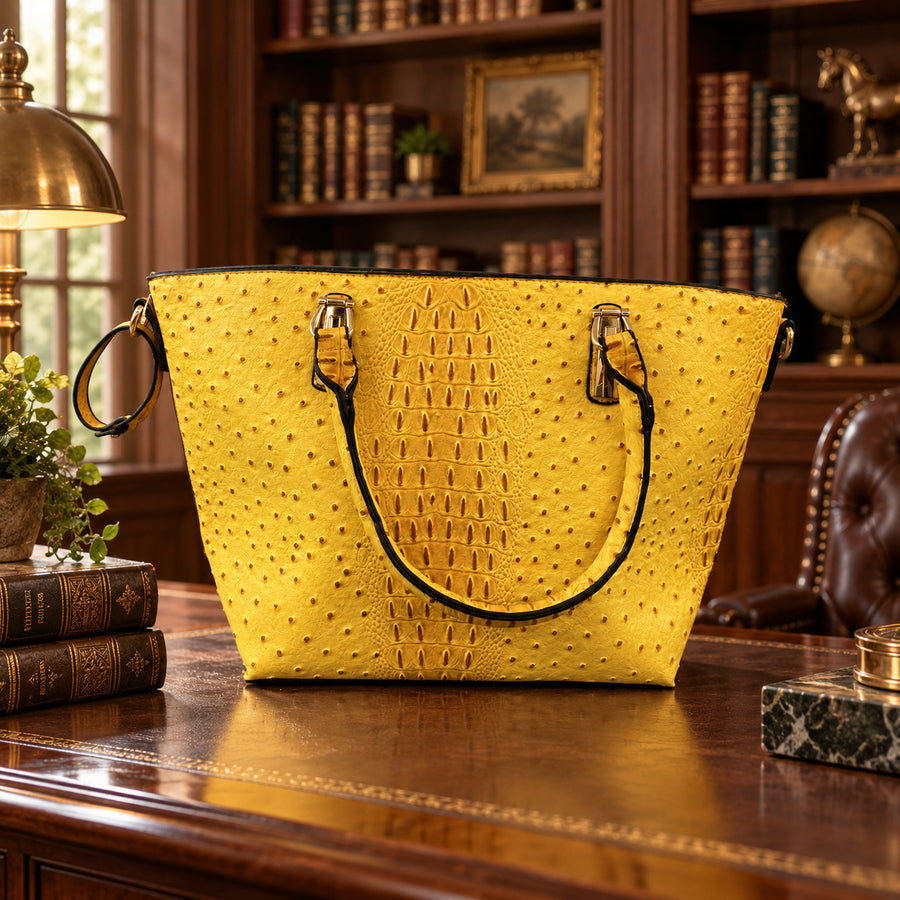 Marigold yellow croc-embossed faux leather tote with gold-tone rings and rolled handles
