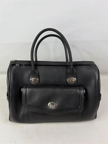 Black leather handbag with silver-tone hardware and turn-lock front pocket, view 3