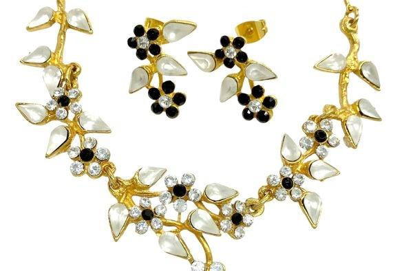 Gold-tone Yoni Z necklace and post earrings with black and white flowers and clear accents, view 2