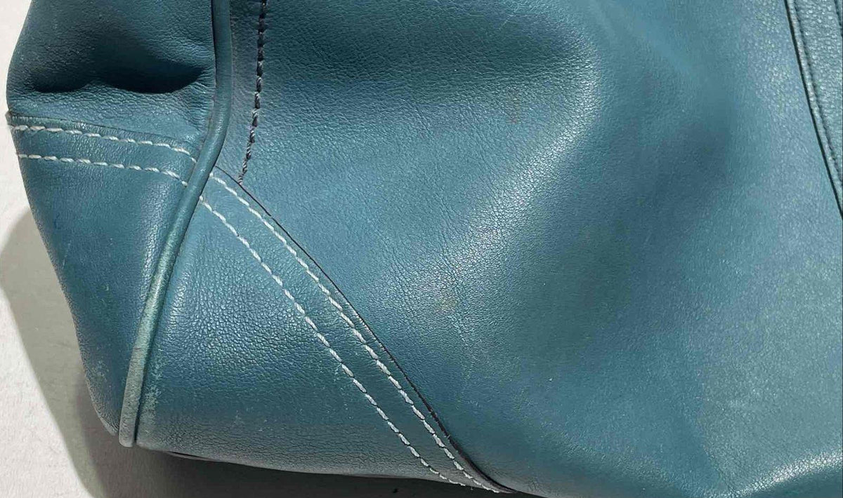 Coach teal leather shoulder bag with silver-tone rings, belted front strap and tasseled ties, view 3