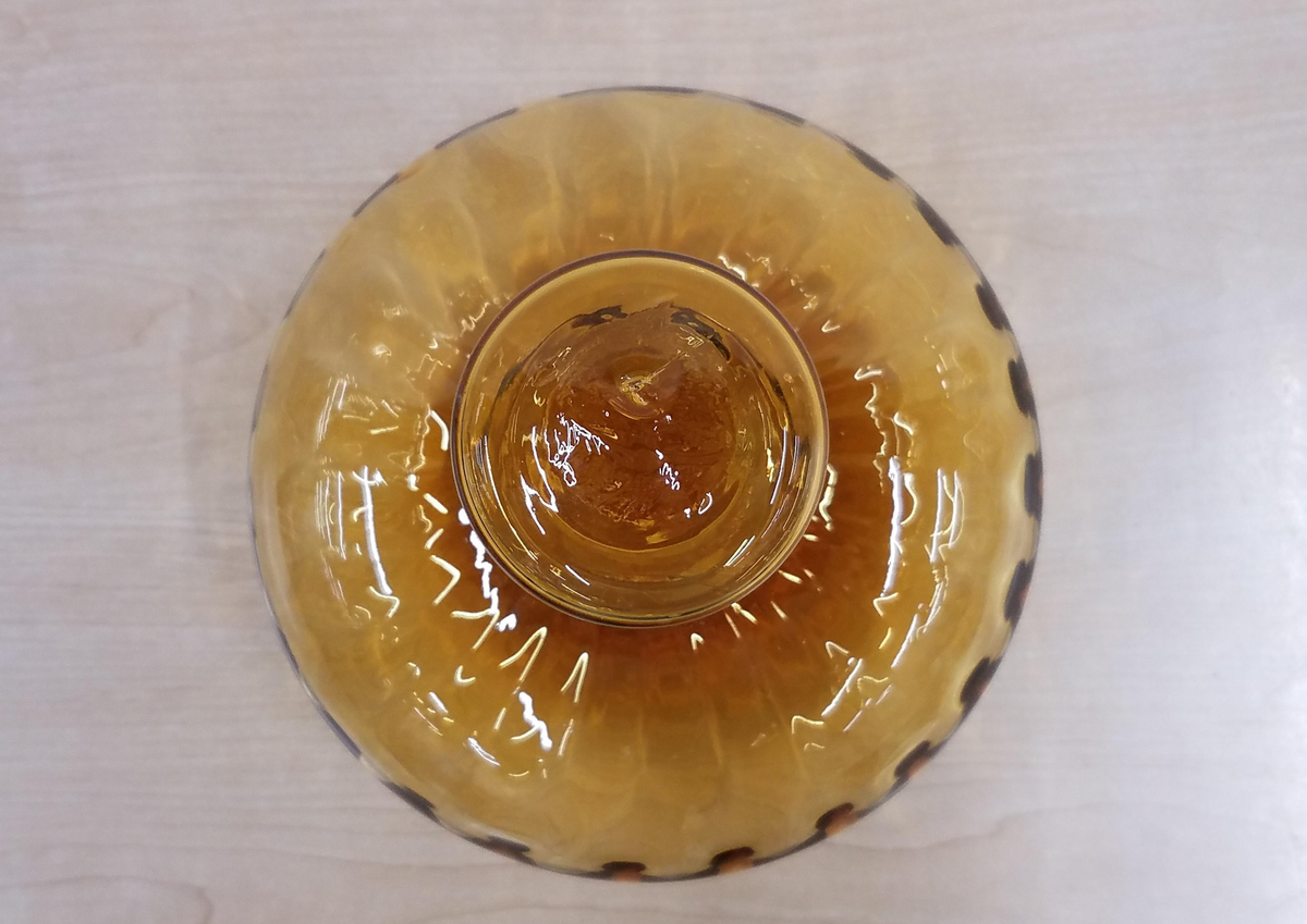 Amber glass decanter with optic ribbed rounded body and faceted stopper, view 6