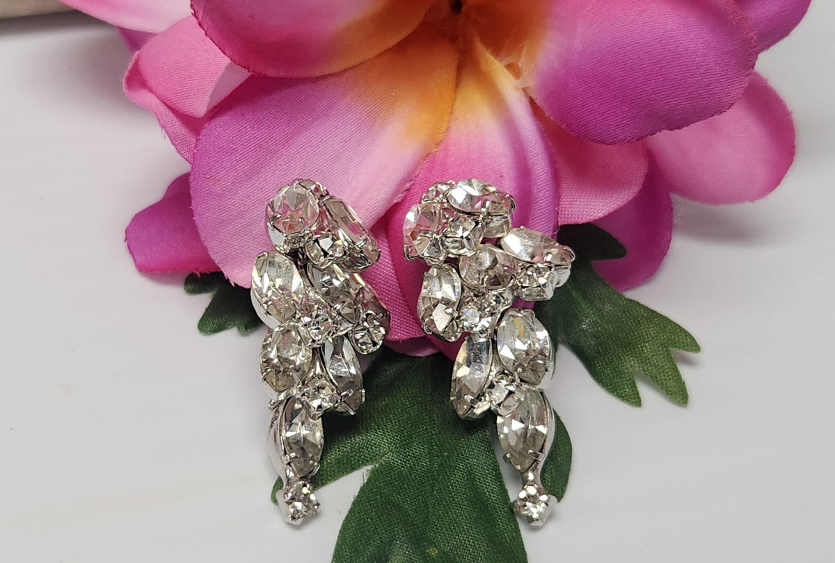 Silver-tone clip-on earrings with a cascade of clear marquise, pear and round rhinestones, view 5