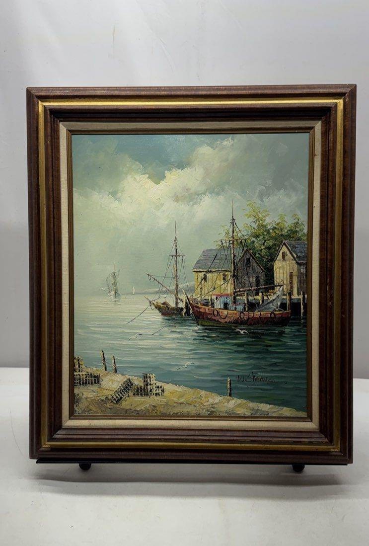 Harbor scene painting of fishing boats at docks in dark wood frame with gold-tone inner border, view 2