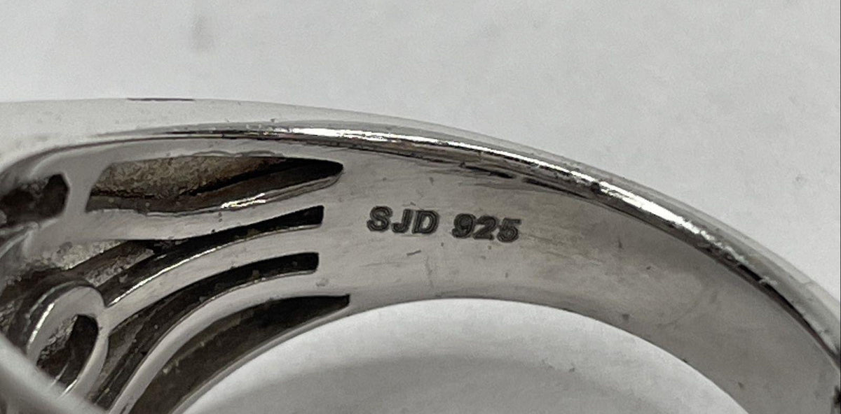 Wide silver tiered cocktail ring with clear baguette and princess-cut stones and blue accents, view 6