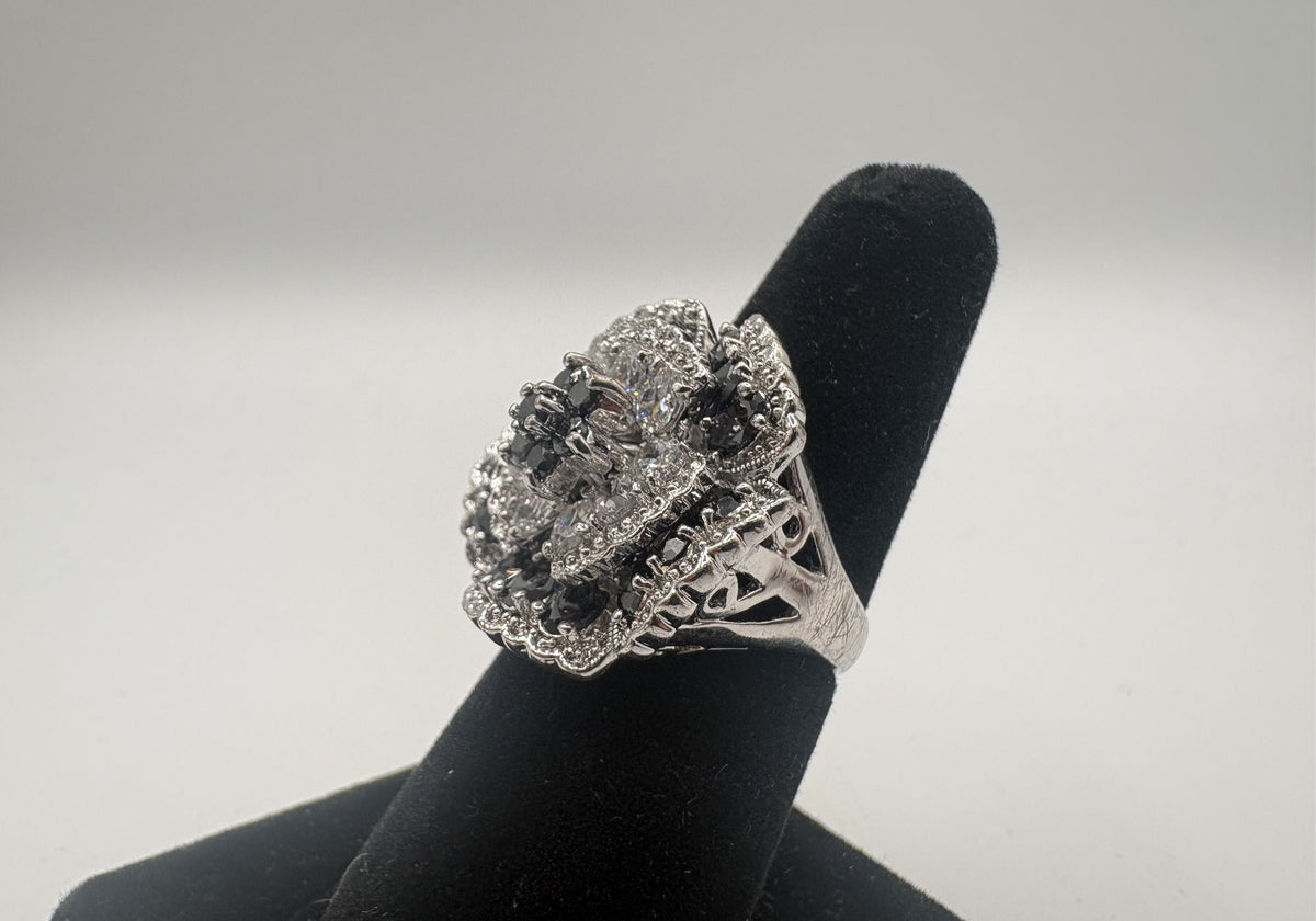 Statement ring with layered floral clusters of black and clear rhinestones, view 3