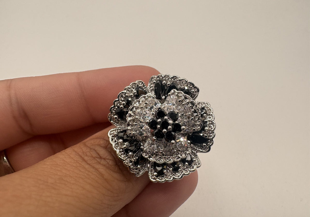 Statement ring with layered floral clusters of black and clear rhinestones, view 6