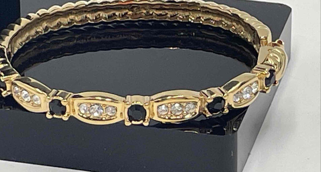 Swarovski Gold-Tone Hinged Bangle Bracelet with Clear and Jet Crystal Accents