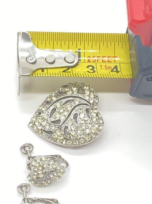 Signed HEDY silver-tone heart brooch and screw-back earrings with champagne rhinestones in navy box, view 5