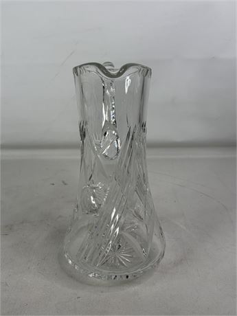 Tall clear cut glass pitcher with floral and leaf decoration and textured handle, view 4