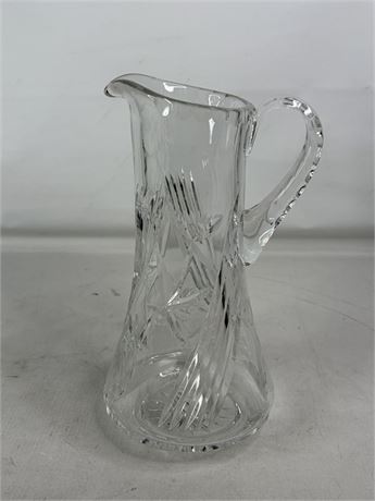 Tall clear cut glass pitcher with floral and leaf decoration and textured handle, view 5