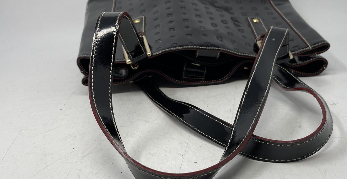 Arcadia black logo-embossed patent leather shoulder tote with red edges and gold-tone buckles, view 5