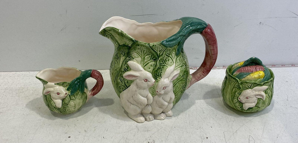 Green ceramic cabbage leaf pitcher, creamer and lidded sugar bowl with white rabbits and carrots, view 2