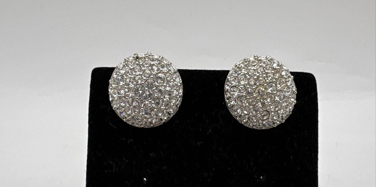 Signed Swarovski silver-tone dome clip-on earrings fully pavé-set with clear crystals, view 2