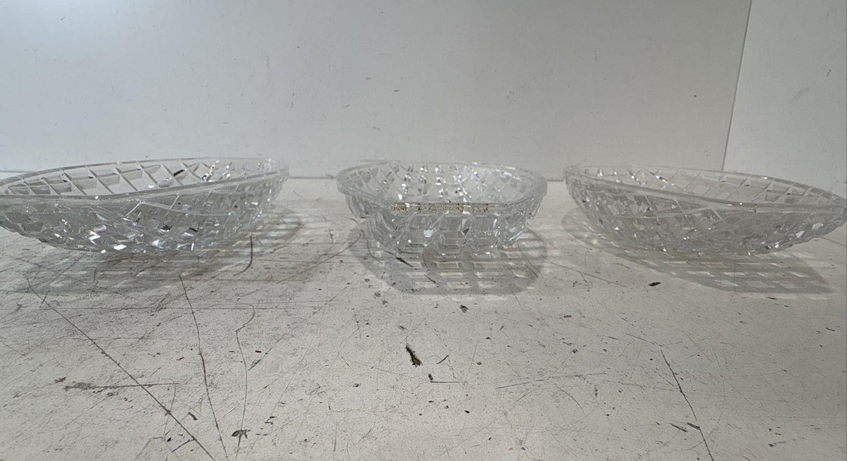 Three clear oval glass serving trays with raised diamond-grid pattern, view 5