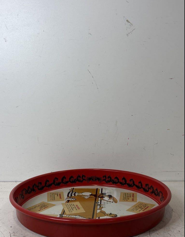 Round red metal cocktail tray with bar scene and printed classic cocktail recipes, view 3