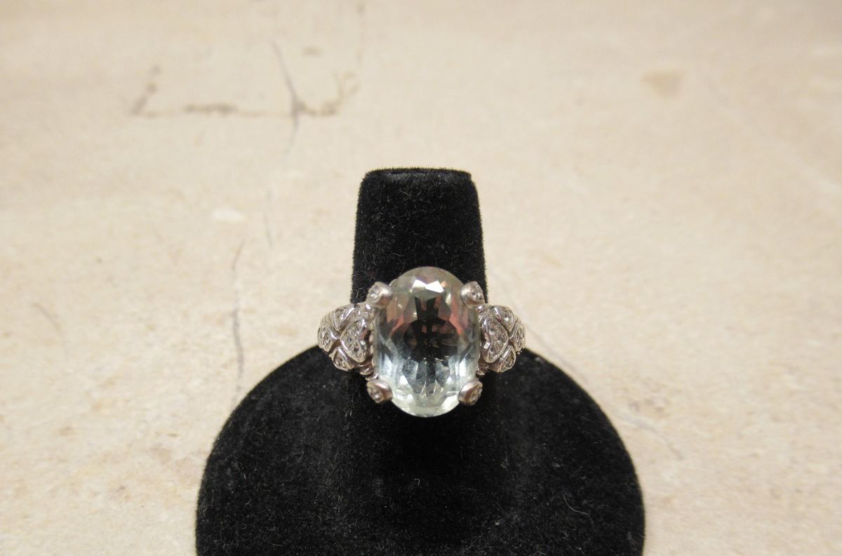 Silver ring with light green cubic zirconia stone, view 2