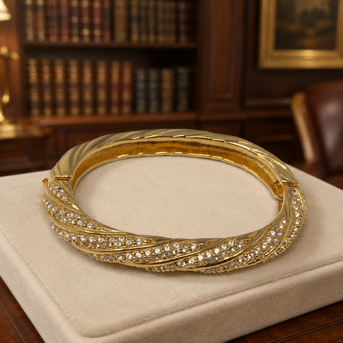 Signed Swarovski gold-tone hinged crossover bangle with rows of clear crystals
