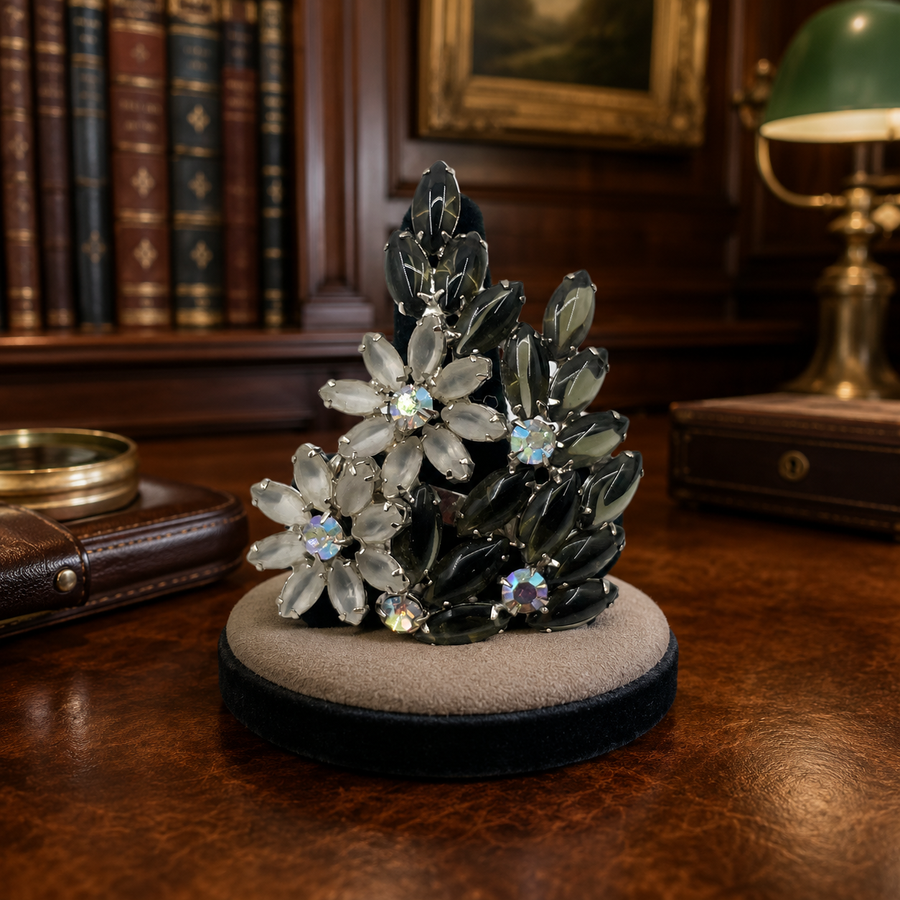 Silver-tone flower spray brooch with smoky gray and clear marquise aurora borealis rhinestones